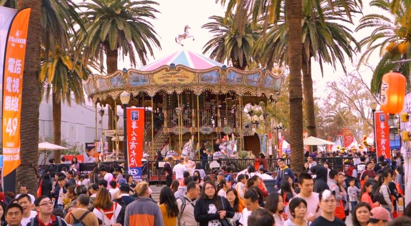 Carousel ride surrounded by visitors