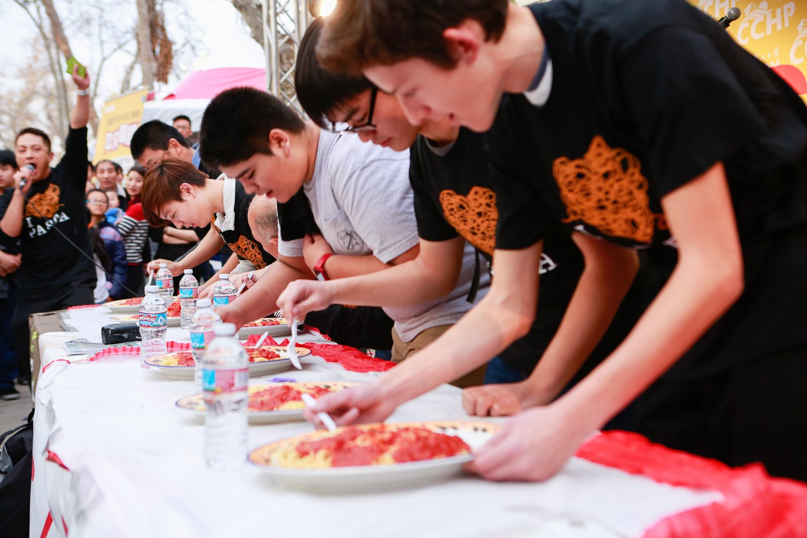 A friendly eating contest on the food street