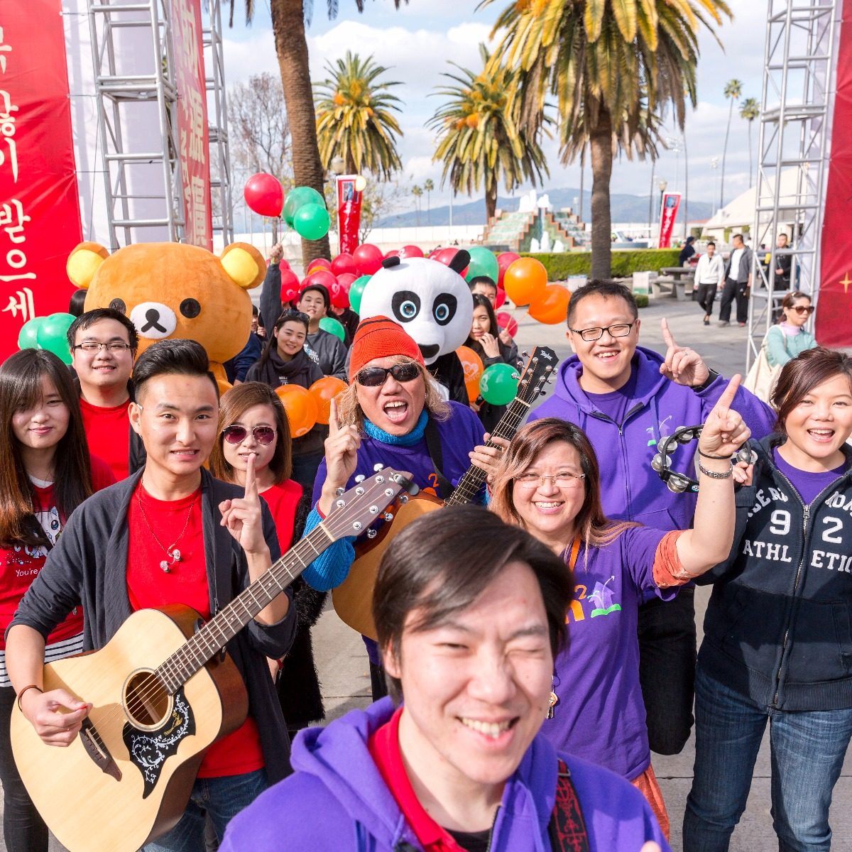 A joyful sing-along with festival mascots and balloons