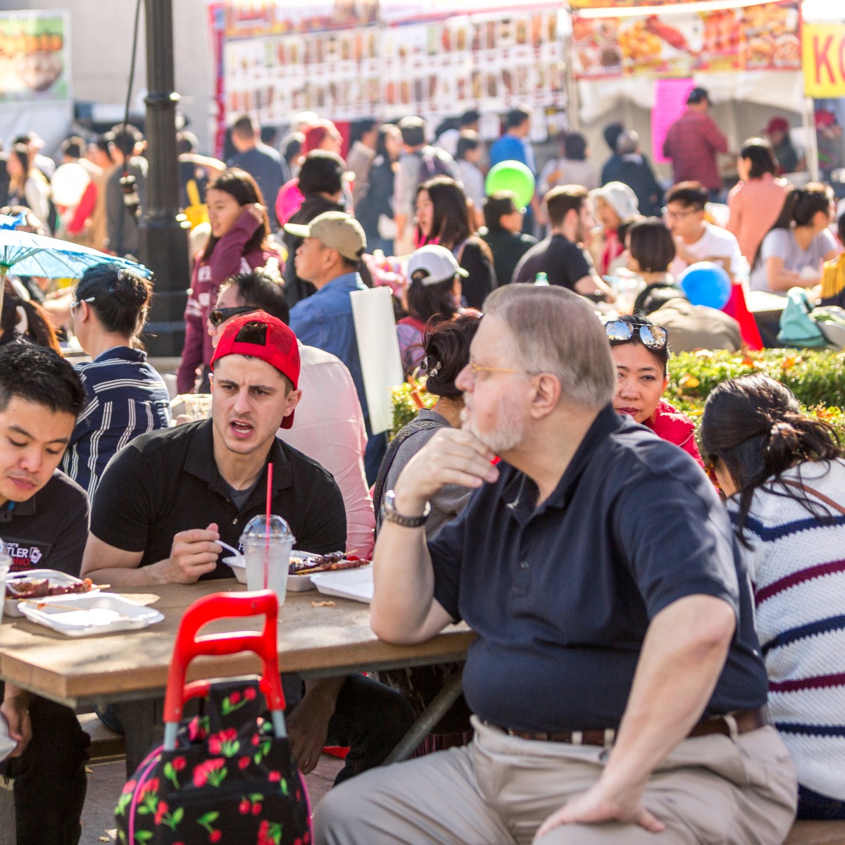 Families enjoying the outdoor food court